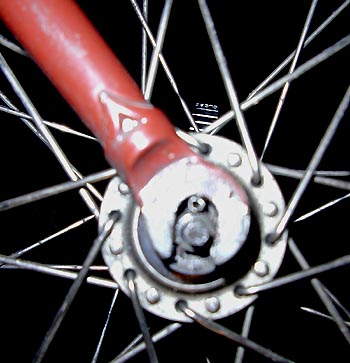 Homemade shim to space the oversizd front tire